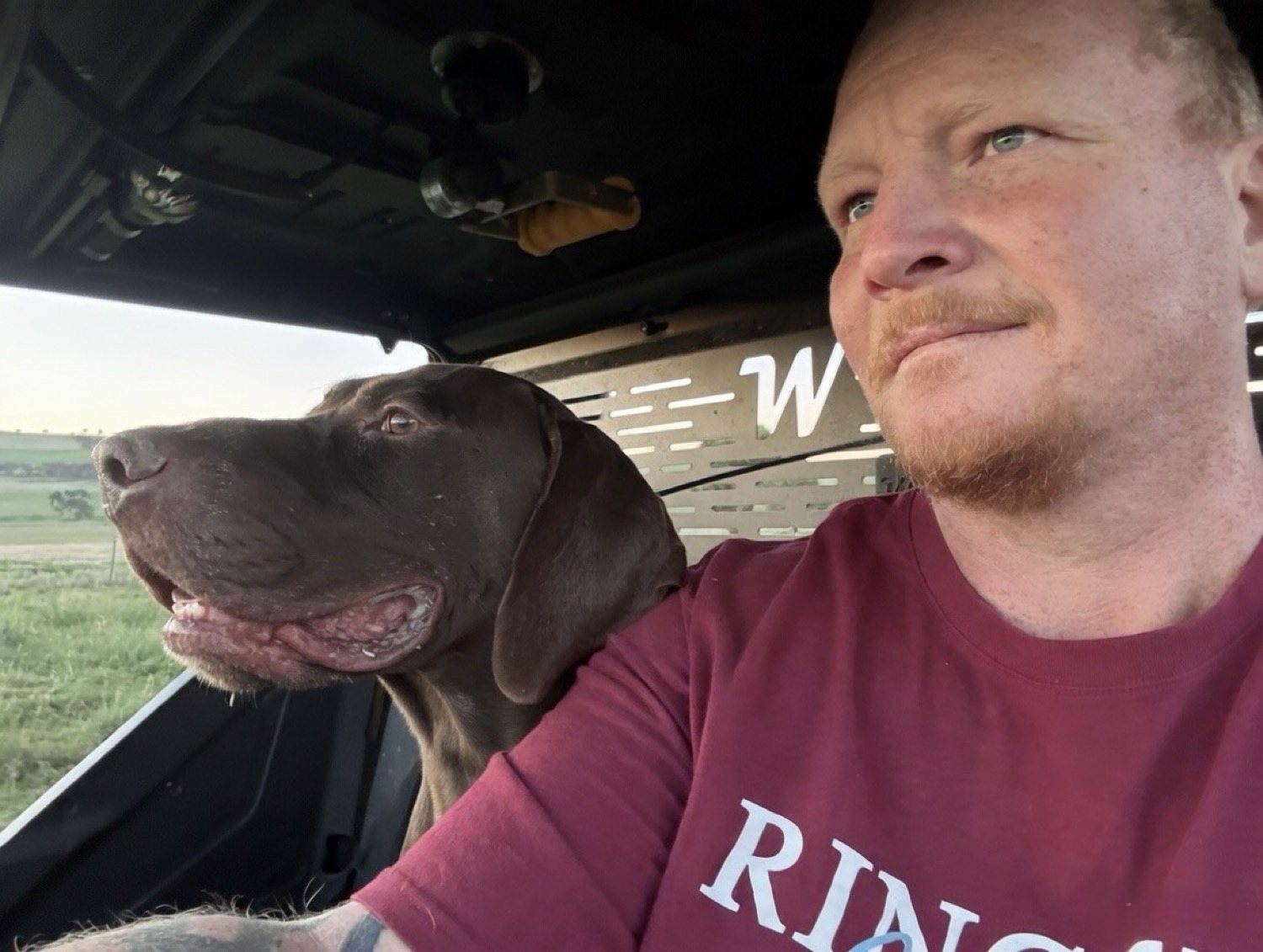 Jon South with working dog during field work